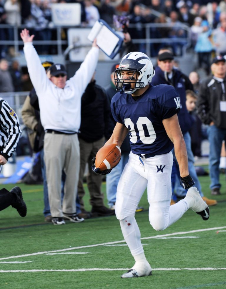   Wyomissing running back Mason Smith runs in for a second quarter touchdown against Aliquippa during the PIAA Class AA high school football championship game, Saturday, Dec. 15, 2012, in Hershey, Pa. (AP Photo/Bradley C Bower)  