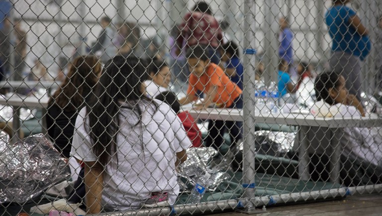 U.S. Border Patrol agents conduct intake of illegal border crossers at the Central Processing Center in McAllen, Texas.