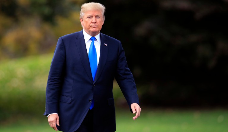 In this Friday, Oct. 13, 2017, file photo, President Donald Trump walks towards reporters on the South Lawn of the White House in Washington. (AP Photo/Manuel Balce Ceneta, File)