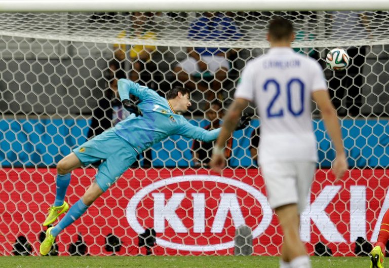 Belgium's goalkeeper Thibaut Courtois can not stop a shot by United States' Julian Green as he scored his side's goal in extra time during the World Cup round of 16 soccer match between Belgium and the USA at the Arena Fonte Nova in Salvador, Brazil, Tuesday, July 1, 2014. (AP Photo/Natacha Pisarenko)