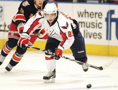 Henny Ray Abrams/AP
According to Caps coach Bruce Boudreau, Mathieu Perreault just played better than the rookies during training camp.