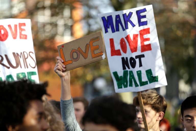 More than 5,000 high school and college students in Seattle walked out of classes on Monday to protest President-elect Donald Trump in what is the second week of demonstrations the incoming leader has faced since winning the election last Tuesday. (AP Photo/Elaine Thompson)