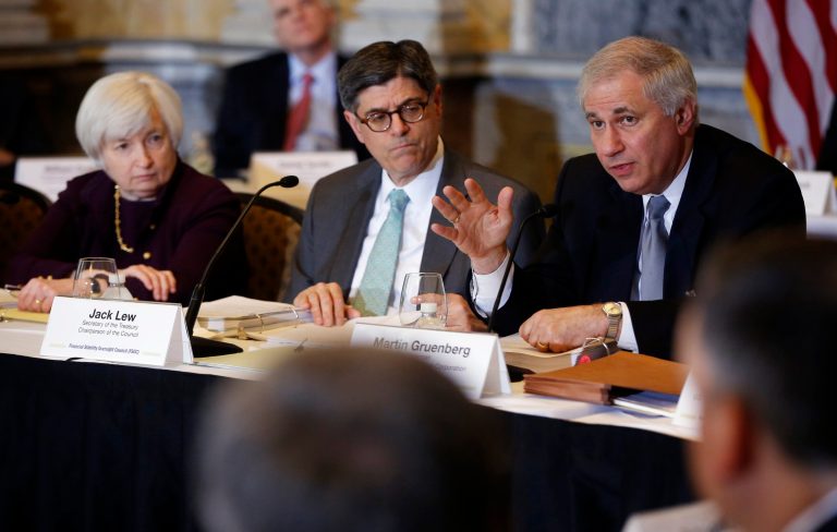 Treasury Secretary Jacob Lew, center, and Federal Reserve Chair Janet Yellen, left, listen as Martin J. Gruenberg, chairman of the U.S. Federal Deposit Insurance Corporation (FDIC), right, speaks during an open meeting of the Financial Stability Oversight Council, which monitors risk to the U.S. financial system, at the Treasury Department in Washington, Wednesday, May 7, 2014.(AP Photo/Charles Dharapak)