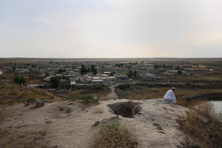 Islamic State has carried out several massacres since it swept into northern and central Iraq in the summer of 2014. (AP Photo/Bram Janssen)