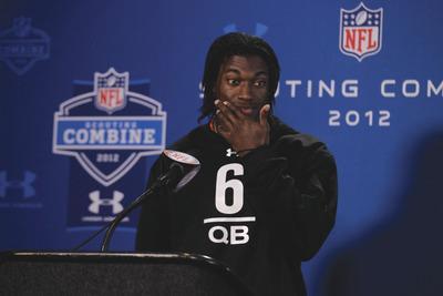 Michael Conroy/APBaylor quarterback Robert Griffin III was measured at 6 feet 23Ã8inches and decided not to throw at the NFL Combine.