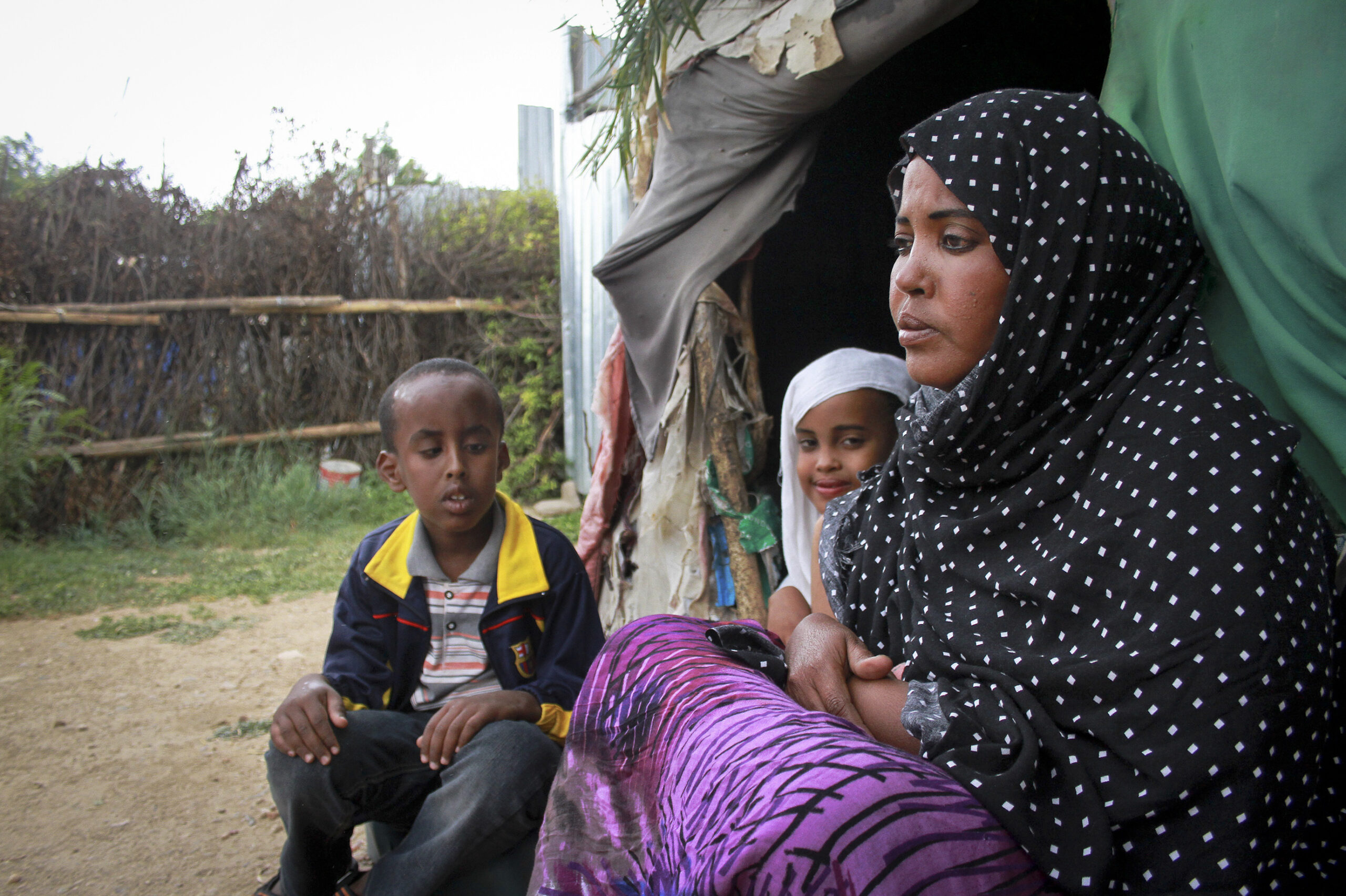 Stowaway boy’s refugee mom cries for son