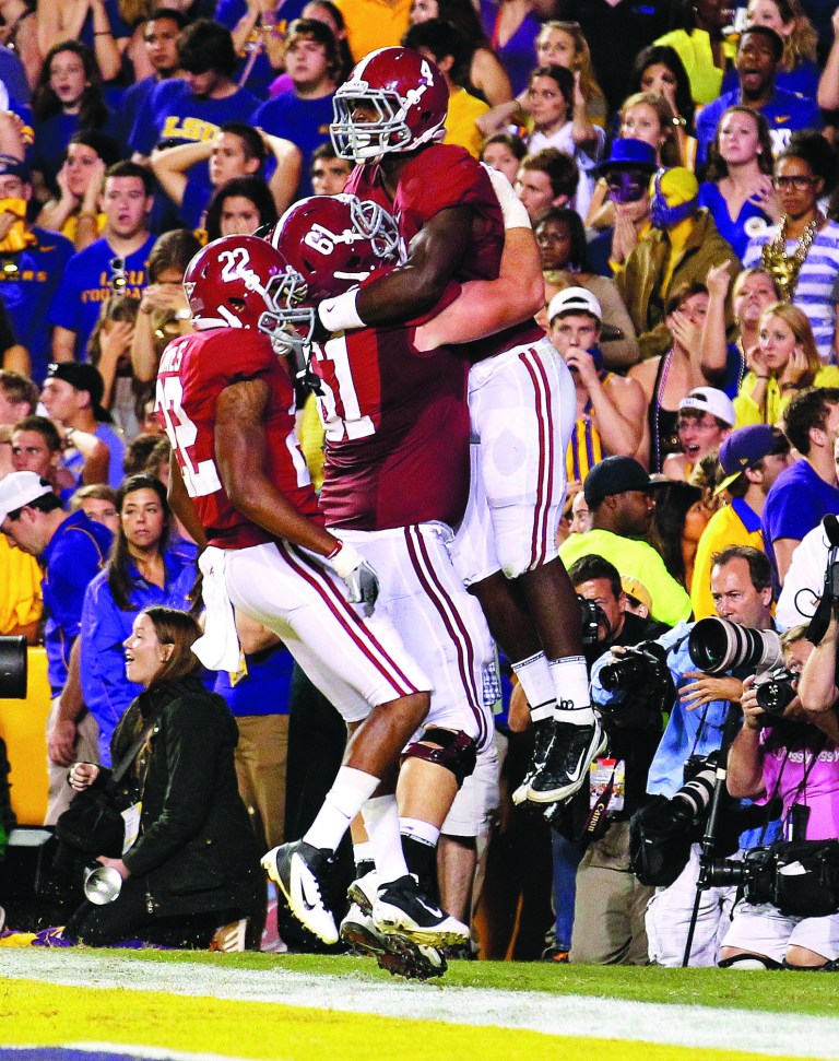 Bill Haber/AP
No. 1 Alabama defeated LSU on Saturday to remain unbeaten and stay atop the rankings.