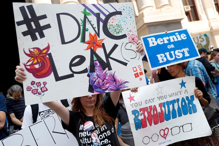 Three top Democratic National Committee officials resigned from their posts in the wake of a recent hack that made thousands of internal emails public. (AP Photo/John Minchillo)