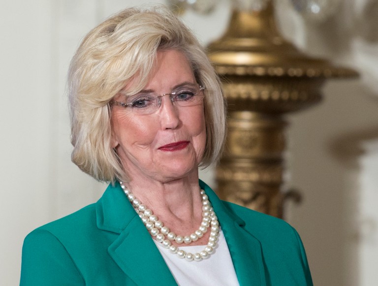 Women's rights activist Lilly Ledbetter looks to the audience as President Obama speaks in the East Room of the White House in Washington, Tuesday, April 8, 2014, during an event marking Equal Pay Day. (AP Photo/Carolyn Kaster)