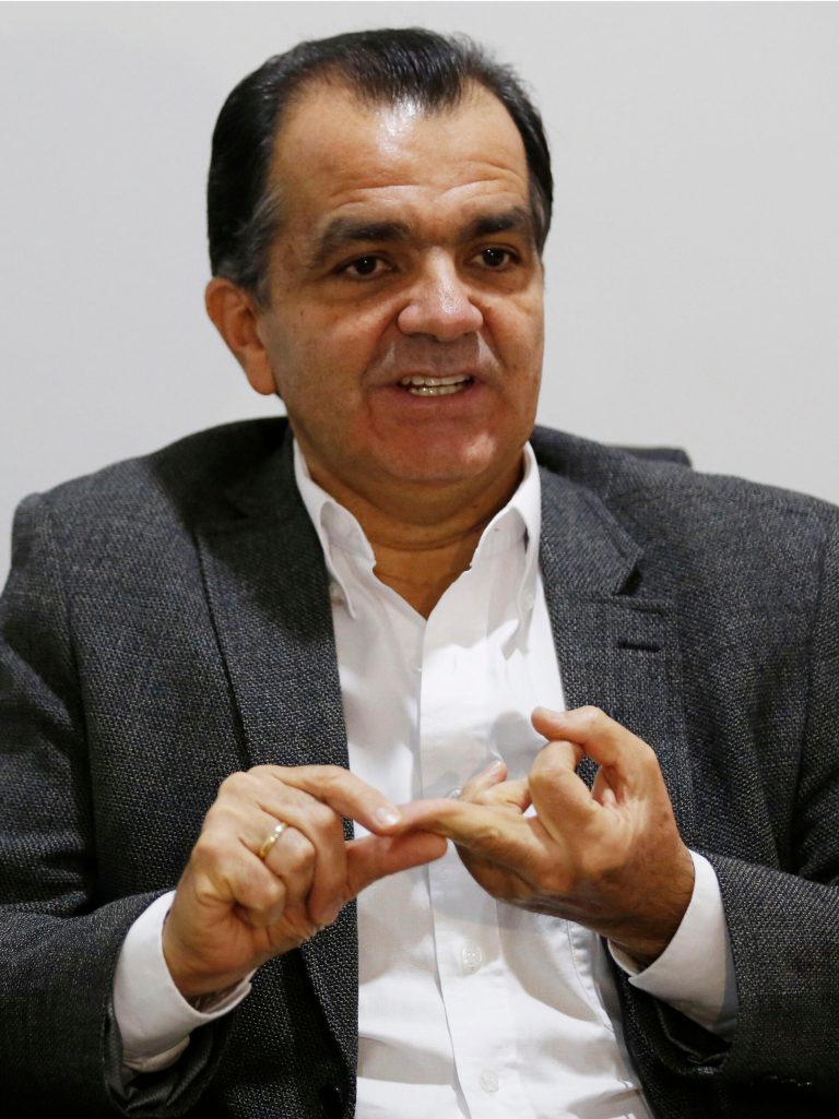 Oscar Ivan Zuluaga, presidential candidate for the Democratic Center speaks during an interview with Associated Press in Bogota, Colombia, Tuesday, June 3, 2014. Zualuaga will face President Juan Manuel Santos, who is seeking a second four-year term as candidate of the Social Party of National Unity, in a presidential runoff on June 15. (AP Photo/Fernando Vergara)