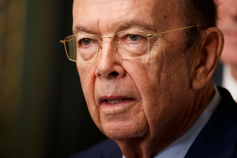 Commerce secretary says U.S. firms face a disadvantage because other countries adjust taxes at the border. (AP Photo/Evan Vucci)