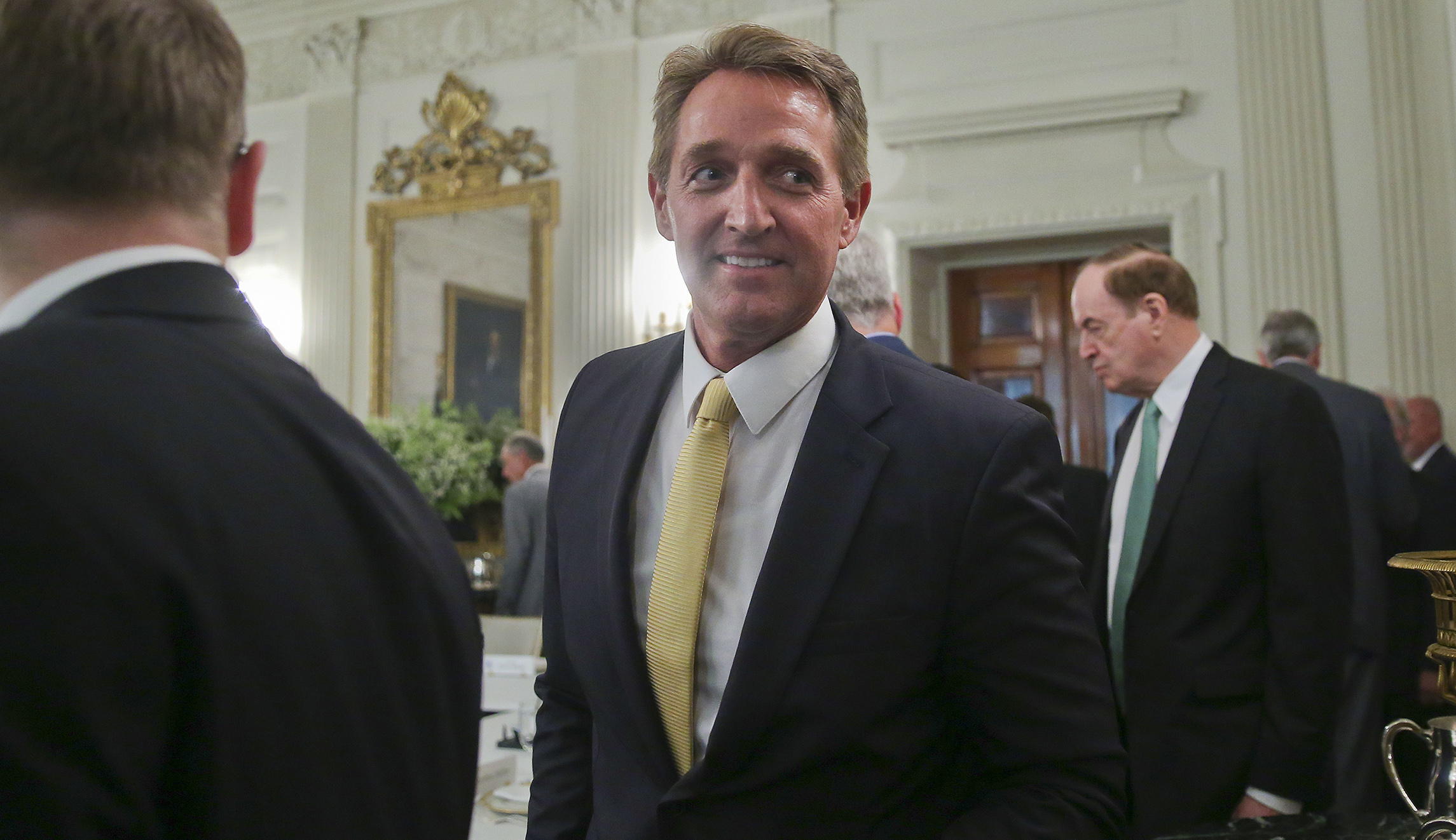 Jeff Flake defeats Cory Booker during partisan snowball duel