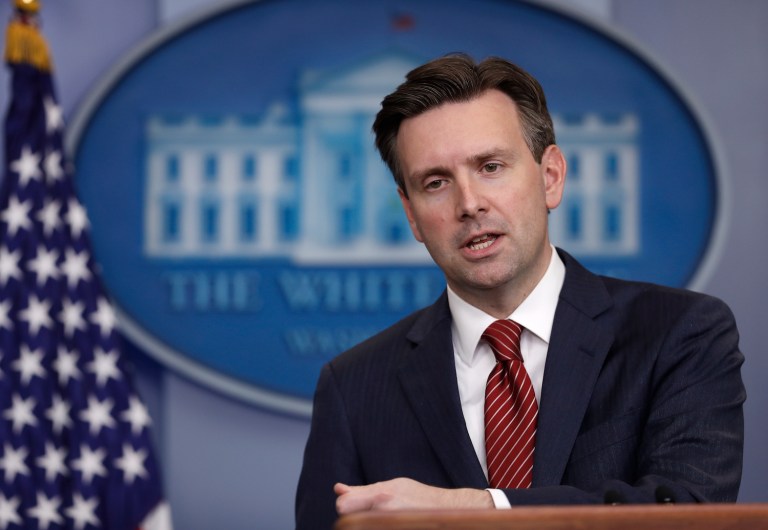 Earnest told reporters his initial comment was 
