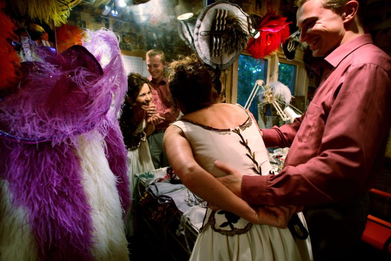 FILE - In this July 4, 2008 file photo, Morten Messerschmidt of the Danish People's Party helps his girlfriend Dot Wessmann with har costume before she goes on stage at  in the amusement park 'Bakken', north of Copenhagen, Denmark . When the Danish People's Party MEP Morten Messerschmidt isn't living in Brussels, he calls the Bakken amusement park north of Copenhagen his home. (AP Photo/POLFOTO, Jan Unger) DENMARK OUT
