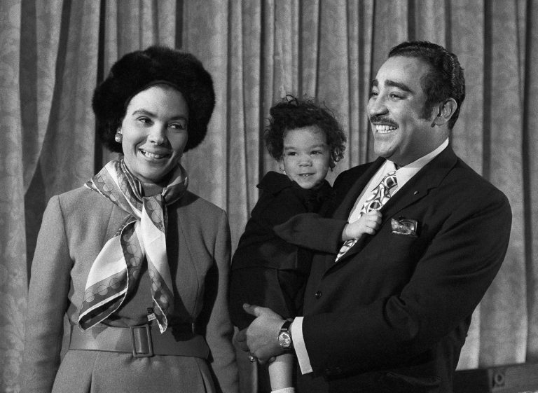 FILE - In this Feb. 20, 1970 file photo, Manhattan Assemblyman Charles B. Rangel announces his bid for the congressional seat held by U.S. Rep. Adam Clayton Powell Jr., D-N.Y. He later defeated Powell. With him are his wife, Alma, and his son, Steven, 20-months old. (AP Photo/Spencer Jones, File)