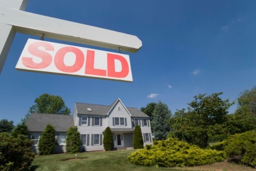 Exterior of house with sold sign