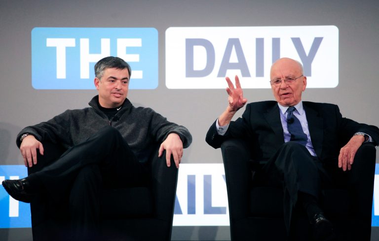   FILE - In this Wednesday, Feb. 2, 2011, file photo, Rupert Murdoch, right, Chairman and CEO of News Corporation, and Eddy Cue, vice president of Apple, attend the launch of The Daily, in New York. News Corp. said it will cease publication of The Daily, on Dec. 15, 2012. News Corp. had hoped The Daily would lure both paying subscribers and advertisers to a digital newspaper that included news, gossip and opinion. (AP Photo/Mark Lennihan)  