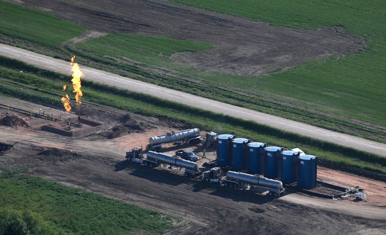 The Environmental Protection Agency dinged a North Dakota fracking company on Friday for $2.1 million for contributing to smog. (AP Photo/Charles Rex Arbogast)