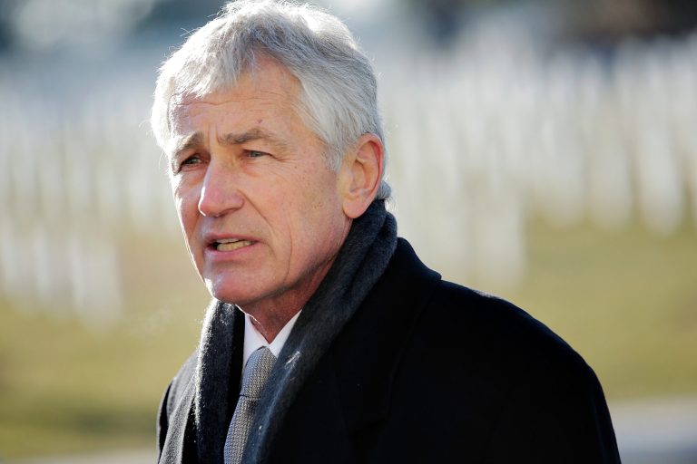 ARLINGTON, VA - FEBRUARY 11: U.S. Secretary of Defense Chuck Hagel leaves after a wreath-laying ceremony at the Tomb of the Unknown Soldier on February 11, 2014 in Arlington, Virginia. 2014 marks the 70th anniversary of the Allied Forces D-Day landing in Normandy, which helped lead to the liberation of France and the European continent. (Photo by T.J. Kirkpatrick/Getty Images)