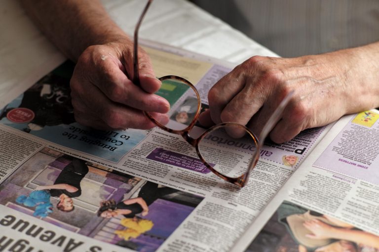 A pensioner reads a newspaper on September 8, 2014 in Walsall, England. (Photo by Christopher Furlong/Getty Images)