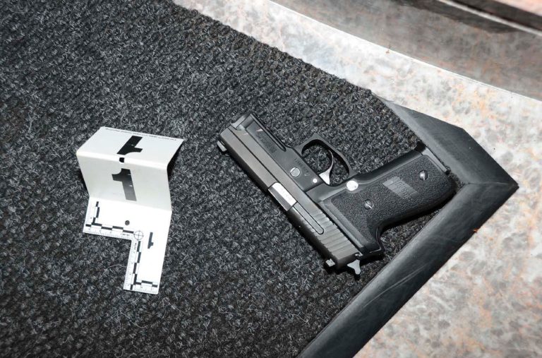   This handout photo provided by the U.S. Attorney's office shows a gun at the scene where Floyd Corkins II shot a security guard at the Family Research Council in Washington in August 2012. Corkins' defense attorney said Tuesday, Sept. 11, 2013 he should spend 11 1/2 years in prison, not the 45 years government lawyers want. Corkinsâ lawyer says his client was mentally ill when he entered a building housing the Family Research Council armed with nearly 100 rounds of ammunition and 15 Chick-fil-A sandwiches and shot and wounded a security guard. (AP Photo/US Attorney's office)  