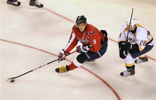 Washington Capitals' Alex Ovechkin, of Russia, (8) skates against Nashville Predators' Ryan Suter (20) during the third period of an NHL preseason hockey game, Tuesday, Sept. 20, 2011, in Baltimore. The Predators won 2-0. 