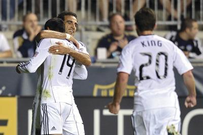 Drew Hallowell/Getty Images
United forward Dwayne De Rosario, left, has an MLS-leading 14 goals this season.