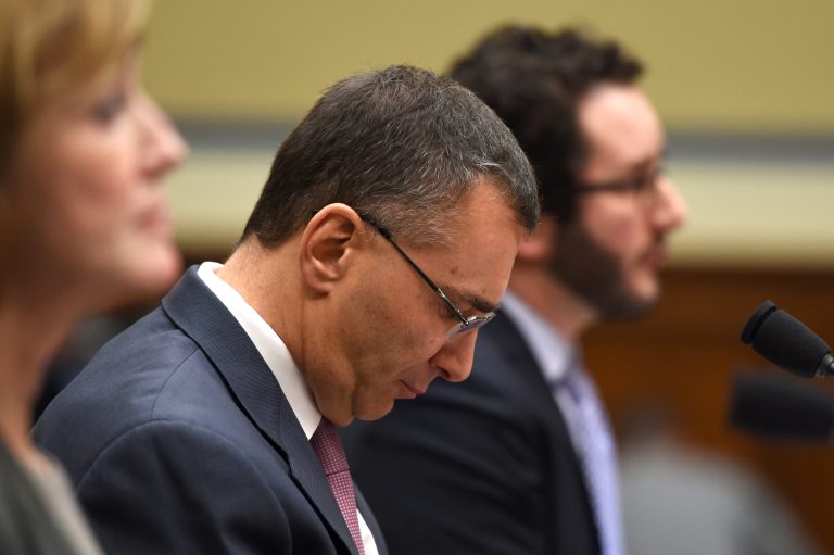 MIT economist Jonathan Gruber listens on Capitol Hill in Washington, Tuesday, Dec. 9, 2014, as he testified before the House Oversight Committee health care hearing. (AP Photo/Molly Riley)