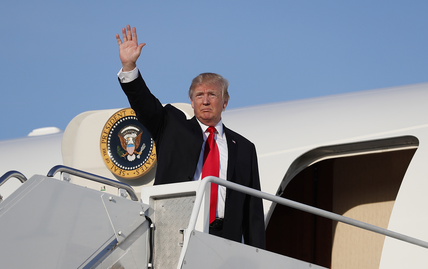 Trump administration officials pushing for Russia hawk to attend meeting with Putin: Report