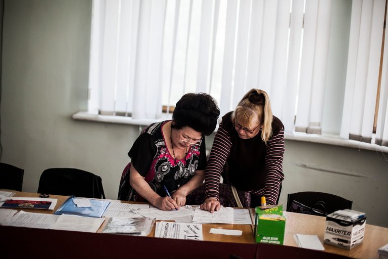 Polling station officials prepare for the upcoming referendum at a polling station in Donetsk, Ukraine, Saturday, May 10, 2014.  Two restive regions in eastern Ukraine are preparing to vote on declaring sovereignty and ceding from Ukraine, in a referendum on Sunday in the Donetsk and Luhansk regions, where pro-Russia insurgents have seized government buildings and clashed with police and Ukrainian troops.(AP Photo/Manu Brabo)