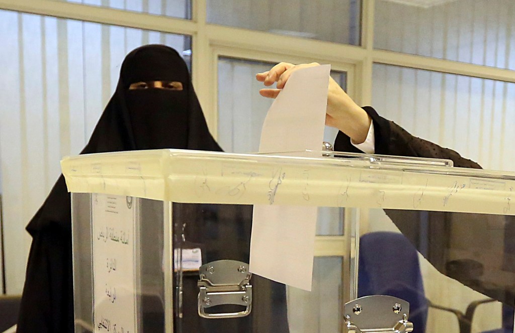 Saudi Arabia holds first election with women