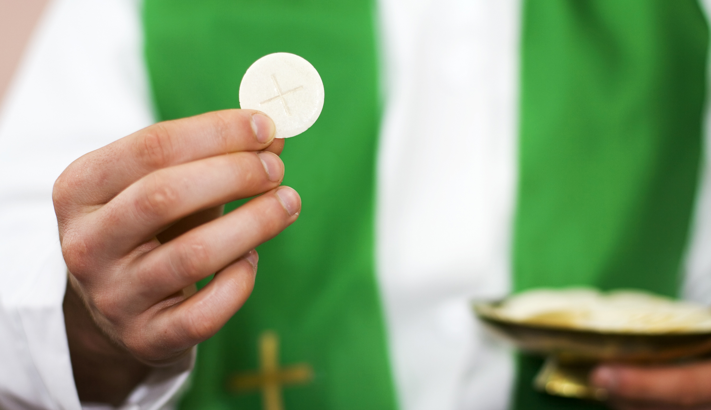 Catholic priest steps down after revealing he was a KKK member who burned crosses