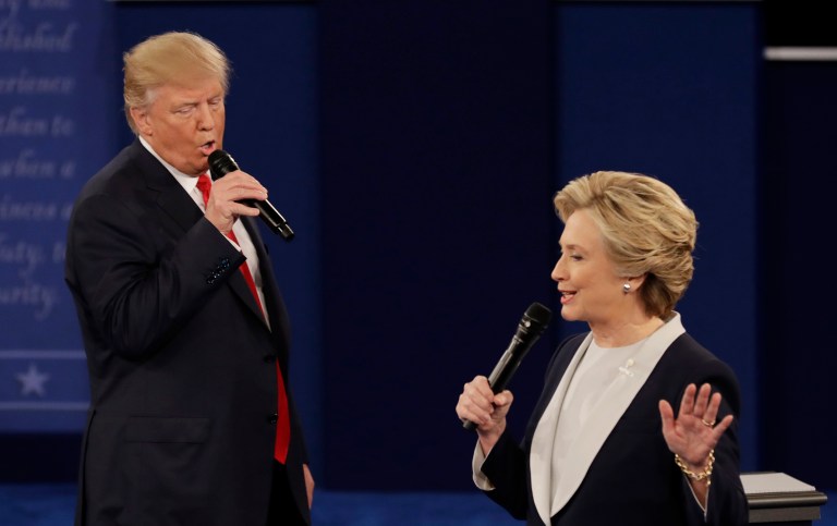 The candidates were asked a question at the second debate about their energy policies, and the balance they must strike between protecting the environment and keeping energy prices low and millions of energy workers employed. (AP Photo/Patrick Semansky)
