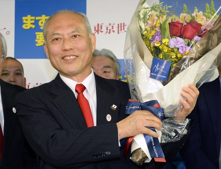Former Health Minister Yoichi Masuzoe celebrates his gubernatorial election victory at his election office in Tokyo, Sunday, Feb. 9, 2014.  Masuzoe, backed by Japan's ruling party, won Tokyo's gubernatorial election on Sunday, defeating two candidates who had promised to end nuclear power. (AP Photo/Kyodo News) JAPAN OUT, MANDATORY CREDIT