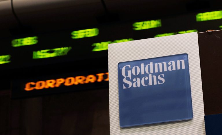 Stock prices whiz by on a ticker near the Goldman Sachs booth on the floor of the New York Stock Exchange April 16, 2010 in New York, New York. (Photo by Chris Hondros/Getty Images)