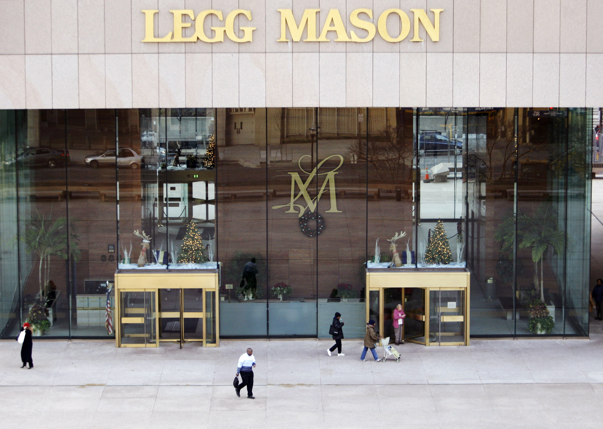 Legg Mason paying $21M in government settlements