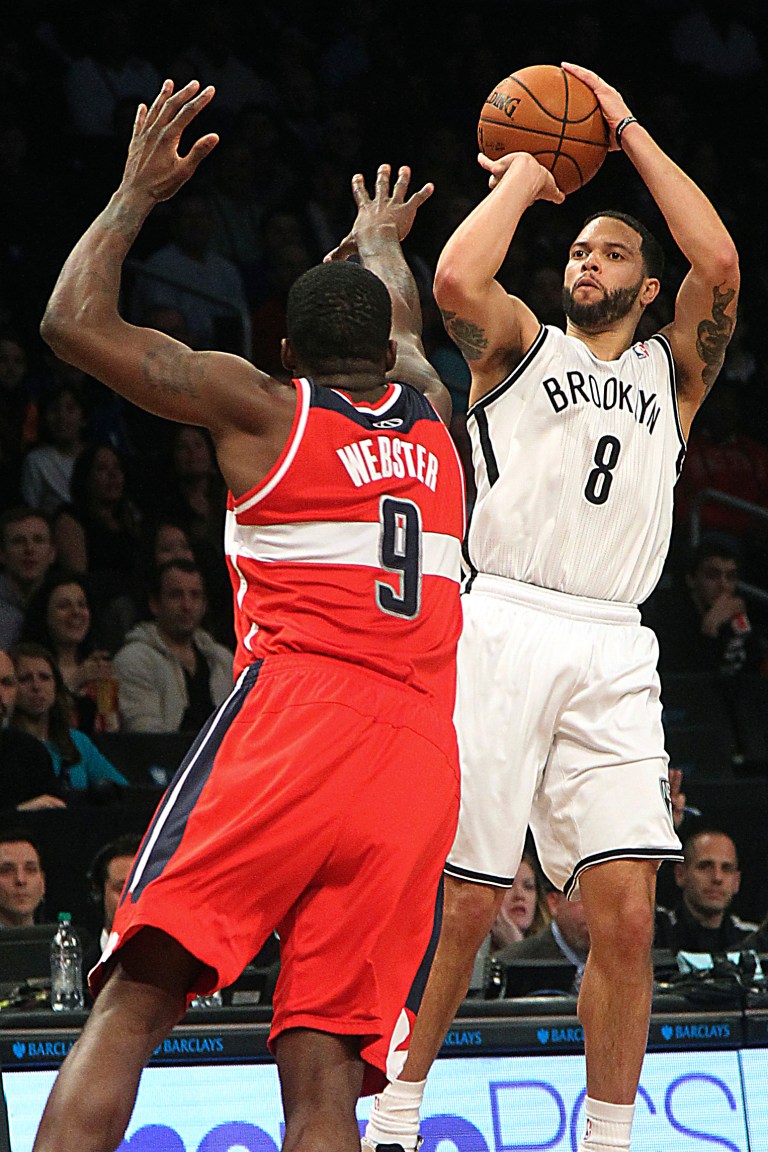 Mary Altaffer/AP
Brooklyn Nets' Deron Williams set the NBA record with nine 3-pointers in a half during the first half of Brooklyn's 95-78 win over the Wizards on Friday.