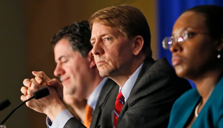 Lawmakers voted to undo the agency's rule that restricts banks and other financial firms from preventing customers from joining in class-action lawsuits. (AP Photo/Steve Helber, File)
