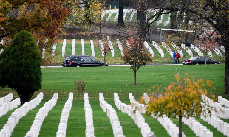 Bikes were previously allowed across much of the cemetery, but the Army said cyclists intermingling with drivers and pedestrians is a hazard. (AP Photo/Kevin Wolf)