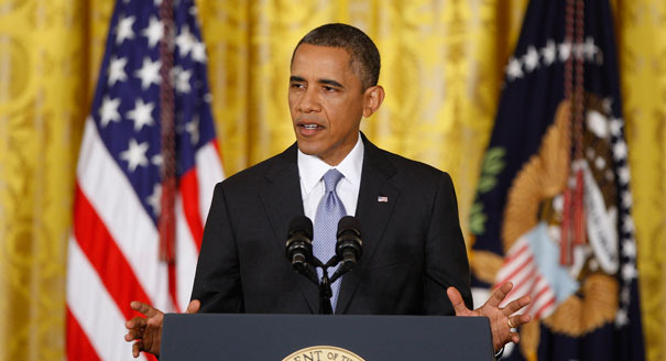 U.S. President Barack Obama addresses a news conference at the White House in Washington, August 9, 2013.  Obama sought on Friday to boost Americans' confidence in sweeping government spying programs revealed by a series of leaks, saying he would work with the U.S. Congress to reform key parts of the anti-terror Patriot Act.  REUTERS/Jonathan Ernst      (UNITED STATES - Tags: POLITICS) - RTX12F7P