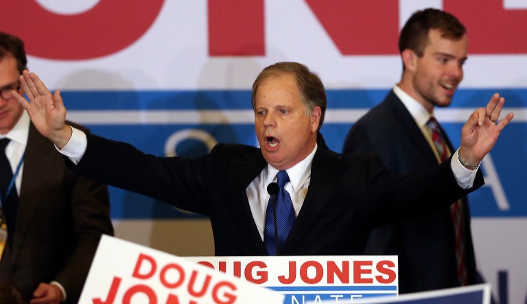 Democrat Doug Jones speaks Tuesday, Dec. 12, 2017, in Birmingham, Ala. In a stunning victory aided by scandal, Jones won Alabama's special Senate election. (AP Photo/John Bazemore)