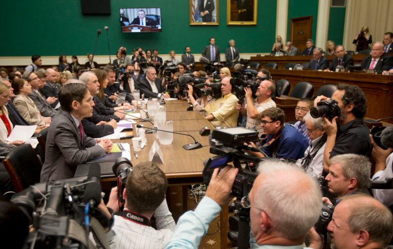 Centers for Disease Control and Prevention (CDC) Director Dr. Tom Frieden, left, prepares to testify on Capitol Hill in Washington, Thursday, Oct. 16, 2014, prior to testifying before the House Energy and Commerce Committee's subcommittee on Oversight and Investigations, to get answers about the Ebola outbreak from top U.S. health officials.  (AP Photo/Pablo Martinez Monsivais