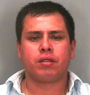 Second photo of serial slashing suspect Johnny D. Guillen Pimentel

