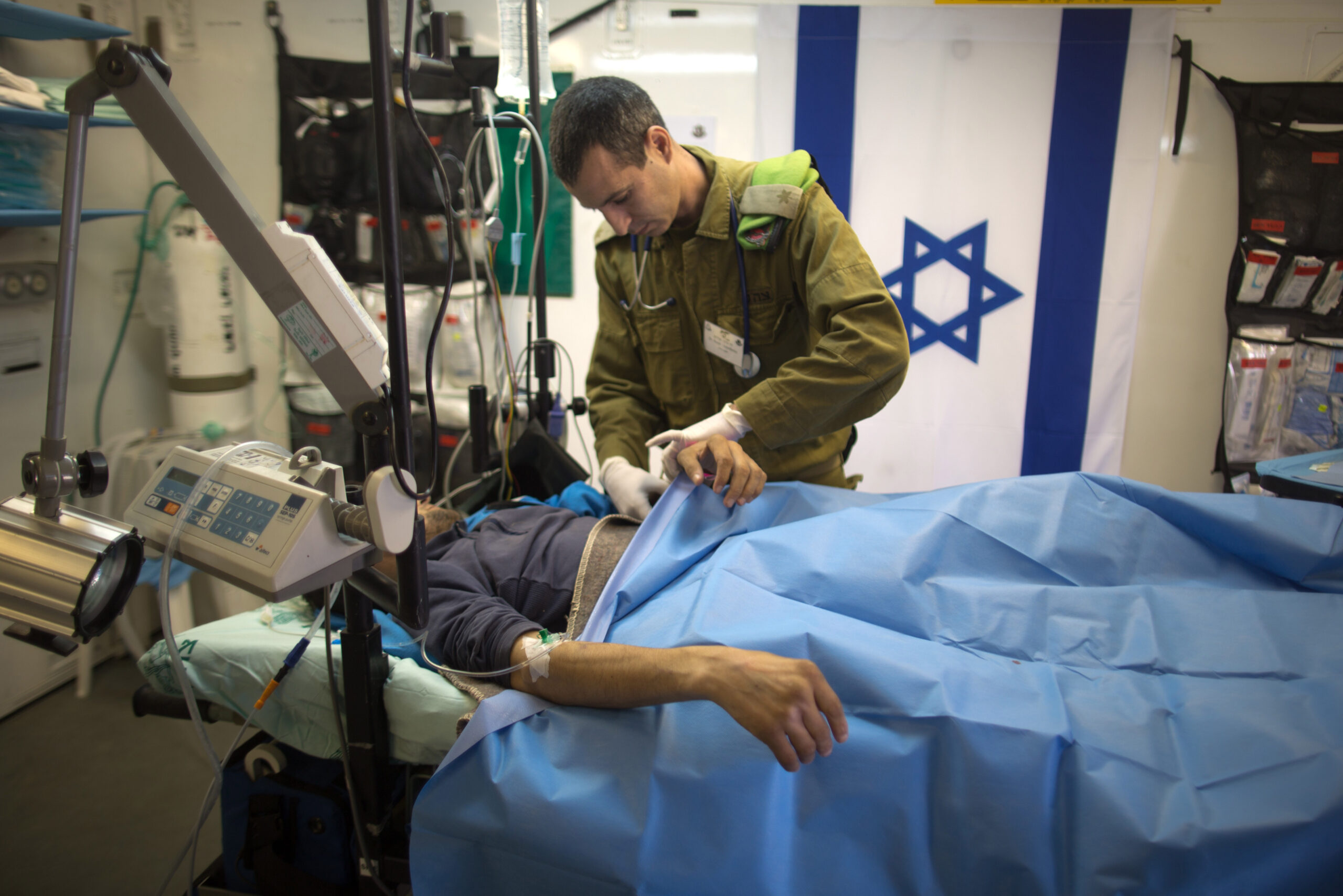 Israeli premier meets wounded Syrians, blames Iran