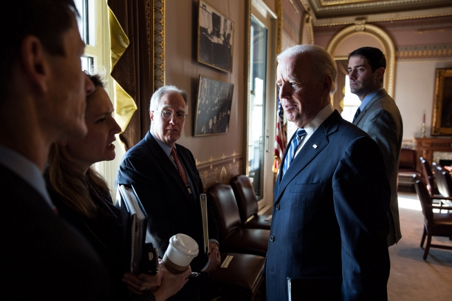 Shailagh Murray, Assistant to the Vice President for Communications, second from left, briefs Vice President Joe Biden about a school shooting at Taft Union High School in Taft, California, following a meeting with sportsmen and rural group representatives at the Eisenhower Executive Office Building, in Washington, D.C., Jan. 10, 2013. Pictured, from left, are: Bruce Reed, the Vice President's Chief of Staff; Mike Donilon, Senior Advisor to the Vice President; and Personal Aide Fran Person. (Official White House Photo by David Lienemann)