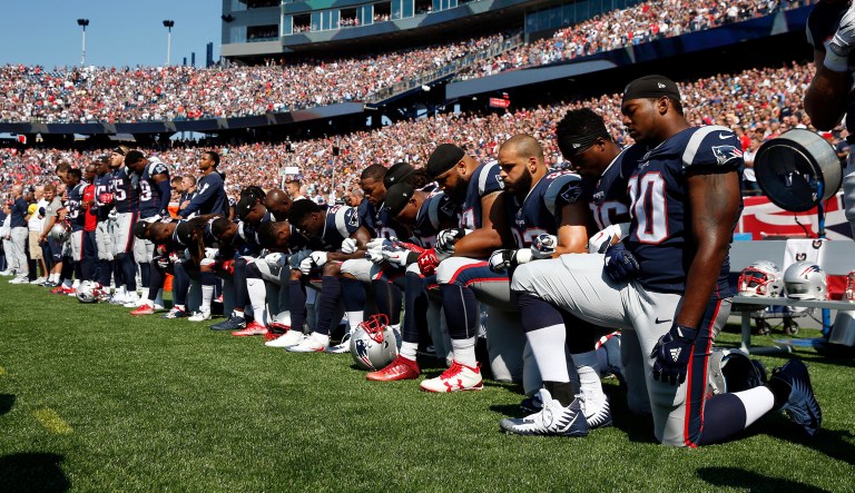 Nearly half of Americans disapprove of NFL player protests against the national anthem, but even more don't like the way President Trump has reacted to them, according to a new poll. (AP Photo/Michael Dwyer)