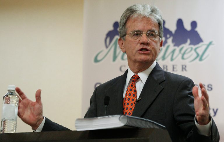 U.S. Sen. Tom Coburn, R-Oklahoma, speaks to a town hall meeting in Oklahoma City, Thursday, Aug. 18, 2011. (AP Photo/Sue Ogrocki)