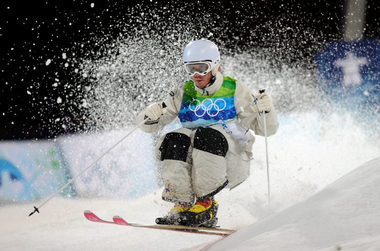 In this Feb. 14, 2010 photo, Dale Begg-Smith of Australia makes his moguls final run at the Vancouver 2010 Olympics in Vancouver, British Columbia. Begg-Smith said he's ready to chase after another Olympic medal after taking nearly three years off to rest his aching body. The 29-year-old moguls skier captured gold at the 2006 Turin Games and silver four years later in Vancouver. Given his long layoff, he knows he's not the favorite at the Sochi Olympics, but likes the underdog role. (AP Photo/Mark J. Terrill)