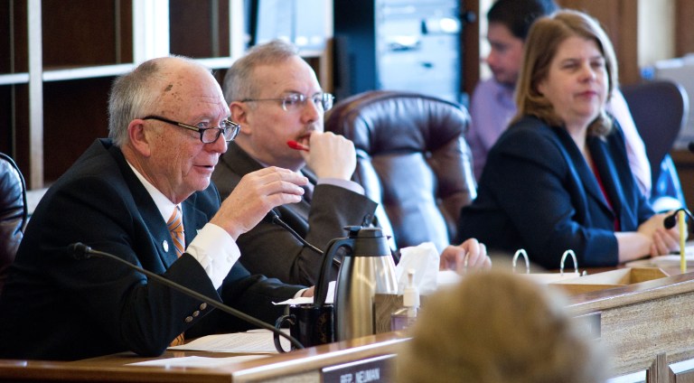 Rep. Steve Thompson, R-Fairbanks, left, asks a question during work on House Bill 134 in the House Finance Committee at the Capitol in Juneau, Alaska. The bill would allow Medicaid payment for scheduled unit dose prescription drug packaging and dispensing services for specified recipients. Rep. Bryce Edgmon, D-Dillingham, center, and Rep. Tammie Wilson, R-North Pole, listen during the session. (AP Photo/Juneau Empire, Michael Penn)