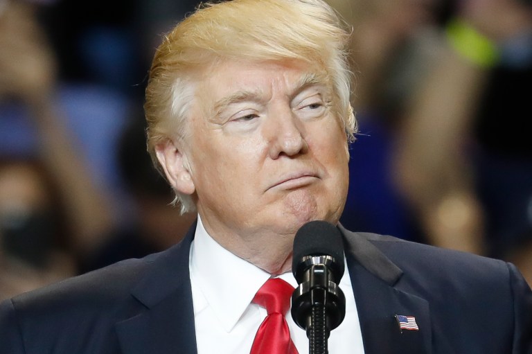 President Donald Trump pauses during his speech during a rally at the Kentucky Exposition Center, Monday, March 20, 2017, in Louisville, Ky. (AP Photo/John Minchillo)